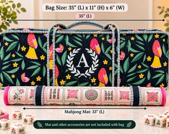 May include: A rectangular black fabric bag with a colorful bird and leaf pattern, featuring a white embroidered letter A inside a laurel wreath. The bag measures 35 inches long, 11 inches high, and 6 inches wide. A rolled mahjong mat is in front.