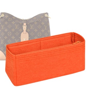 May include: Orange felt bag organiser with multiple compartments and a zipped pocket. The organiser is designed to fit inside a handbag.