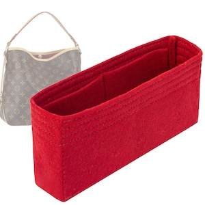 May include: Red felt bag organiser with multiple compartments for a handbag.