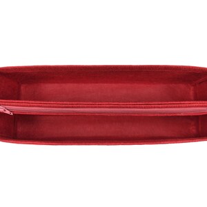 May include: Red felt bag organizer with a zippered divider. The organizer is empty and open, showing the interior.