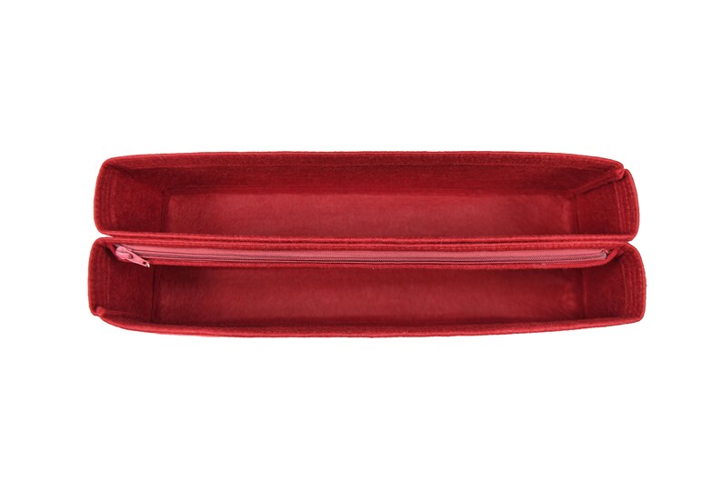 May include: Red felt bag organizer with a zippered divider. The organizer is empty and open, showing the interior.