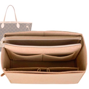 May include: Beige felt bag organizer with multiple pockets and a zippered compartment. The organizer is designed to fit inside a larger tote bag.