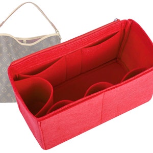 May include: Red felt bag organiser with multiple compartments and pockets for a handbag.