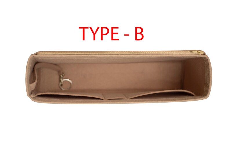 May include: Beige felt bag organizer with multiple pockets and a zipper closure. The organizer has a key ring and the text "TYPE - B" is printed on the top.