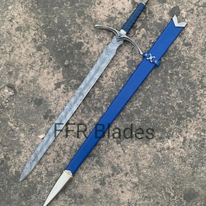 May include: A sword with a patterned Damascus steel blade, a blue wrapped grip, and a silver-toned crossguard and pommel. It is accompanied by a matching blue scabbard with silver-toned metal fittings. The text FFR Blades is visible.