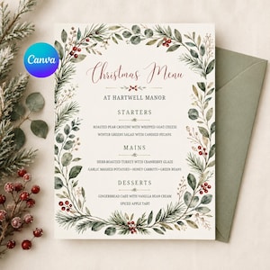 May include: A Christmas menu card featuring a botanical border of pine needles, eucalyptus leaves, and red berries. The text reads: Christmas Menu, AT HARTWELL MANOR, STARTERS, MAINS, DESSERTS, and lists various holiday food items in black font.
