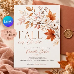Puede incluir: Una tarjeta de invitación rectangular blanca con una ilustración en acuarela de hojas de otoño y flores blancas. El texto dice: FALL in love, Join us for a bridal shower honoring Camille Foster, Sunday, October 4th at 2:00 in the afternoon.