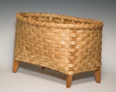 Hand woven footed basket