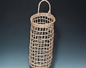 Hand woven potato basket