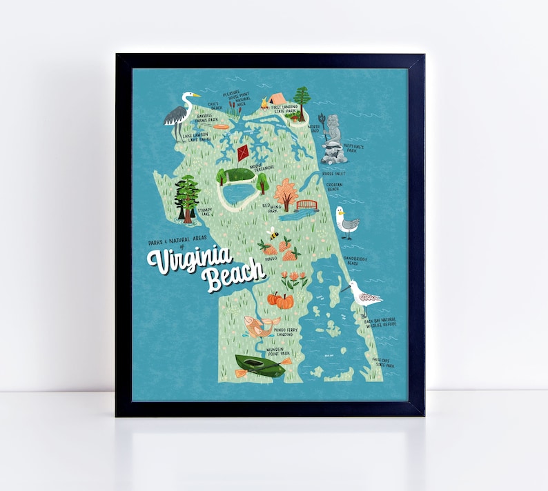 Print of an illustrated Virginia Beach in a black frame. This image shows what the print looks like in a frame. The print does not come with a frame.