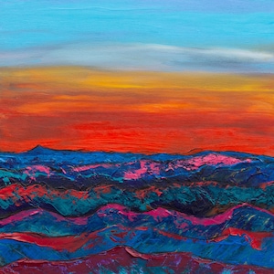 May include: An oil painting on canvas depicting a landscape with layered mountain ranges in shades of deep blue, magenta, and dark purple. Above the mountains, a vibrant sky transitions from a bright red horizon to orange and light blue.