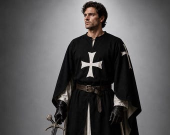 May include: A black tunic featuring a white cross emblem on the chest, worn over a long white undergarment. The outfit includes a brown leather belt, black leather gloves, and black boots. A metal sword with a cross-shaped pommel is held in one hand.