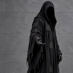 May include: A floor-length black hooded robe featuring a distressed texture with multiple rectangular fabric patches sewn onto the surface. The garment has long, wide sleeves with frayed edges and a deep hood that obscures the face.