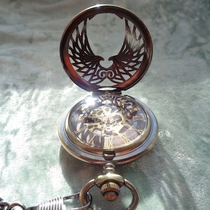 Pocket watch mechanical pendant watch for men and women phoenix eagle visible clockwork image 4