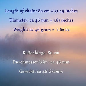 May include: Image with text detailing measurements. The chain length is 31.49 inches (80 cm), the diameter is 1.81 inches (46 mm), and the weight is 1.62 oz (46 grams). The background is a misty landscape with a gradient of blue and orange.