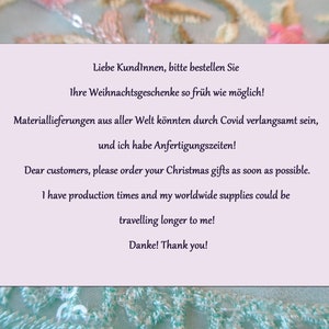 May include: A light purple card with a message in both English and German. The message encourages customers to order their Christmas gifts as soon as possible due to potential delays in shipping and production.