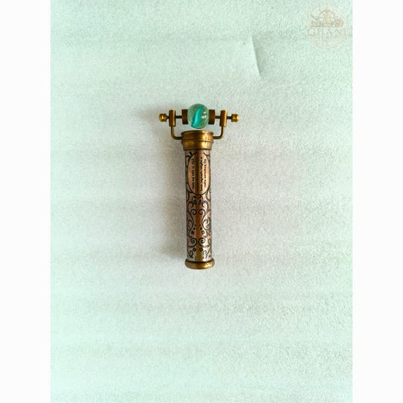 A real brass kaleidoscope you can actually hold and peer through — handcrafted Victorian desk candy that feels like it belongs in a curiosity cabinet.