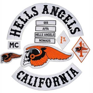 May include: A collection of embroidered patches featuring a white arched top rocker with black text reading HELLS ANGELS, a bottom rocker reading CALIFORNIA, a central skull with orange wings, and smaller patches with text 666, AFFA, NOMADS, and 1%.