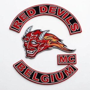 May include: A set of embroidered patches featuring a curved top rocker with the text RED DEVILS, a central devil head emblem with flames, a small rectangular MC patch, and a curved bottom rocker with the text BELGIUM in red and white.