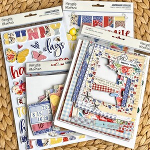 May include: A collection of Simple Stories brand scrapbooking supplies including foam stickers with the text SUNNY days, chipboard stickers featuring a bunting banner, and a pack of six photo frames with floral, gingham, and vintage patterns.
