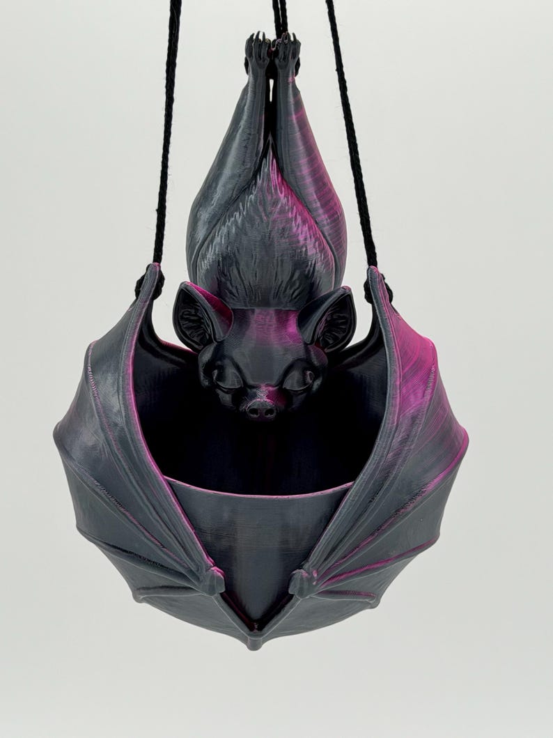 Pink and Black Silk.  Check out the video for a really good glimpse of just how beautiful this color is.  Low stock, and additional time may be needed. Please keep in mind every bat will have a different variation of the pink and black.