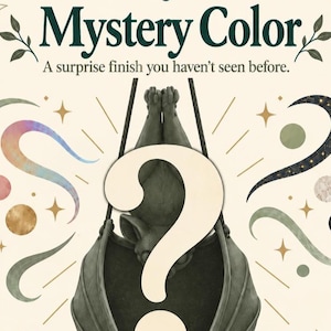 May include: A graphic illustration featuring the text Mystery Color and A surprise finish you haven't seen before. A large cream-colored question mark overlays a dark green hanging bat figure, surrounded by decorative stars and abstract shapes.