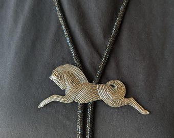 Ornate horse + sparkle cord statement bolo