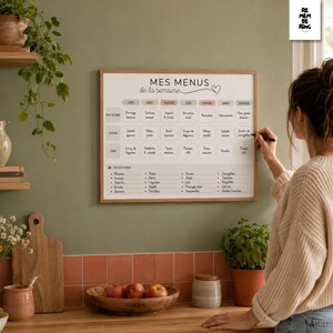 May include: A rectangular wall-mounted weekly meal planner board with a white background and black text titled "MES MENUS de la semaine". It features a grid for breakfast, lunch, and dinner for seven days, plus a grocery list section at the bottom.