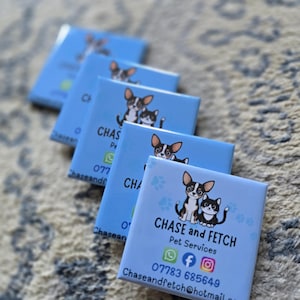 May include: A stack of square light blue magnets featuring a cartoon dog and cat illustration. The text reads CHASE and FETCH Pet Services, including a phone number 07783 685649, email address chaseandfetch@hotmail.com, and social media icons.