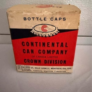 May include: A rectangular cardboard box for bottle caps with a cream top and a red lower section. The text reads BOTTLE CAPS, CONTINENTAL CAN COMPANY OF CANADA LIMITED, CROWN DIVISION, and lists addresses in Montreal, Toronto, Winnipeg, and Vancouver.