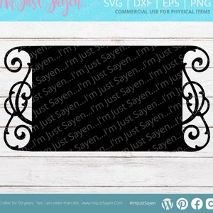 May include: Black rectangular SVG design with decorative scrollwork on the corners. The design includes the text "I'm Just Sayen" and "Commercial Use for Physical Items". The design is suitable for crafters.