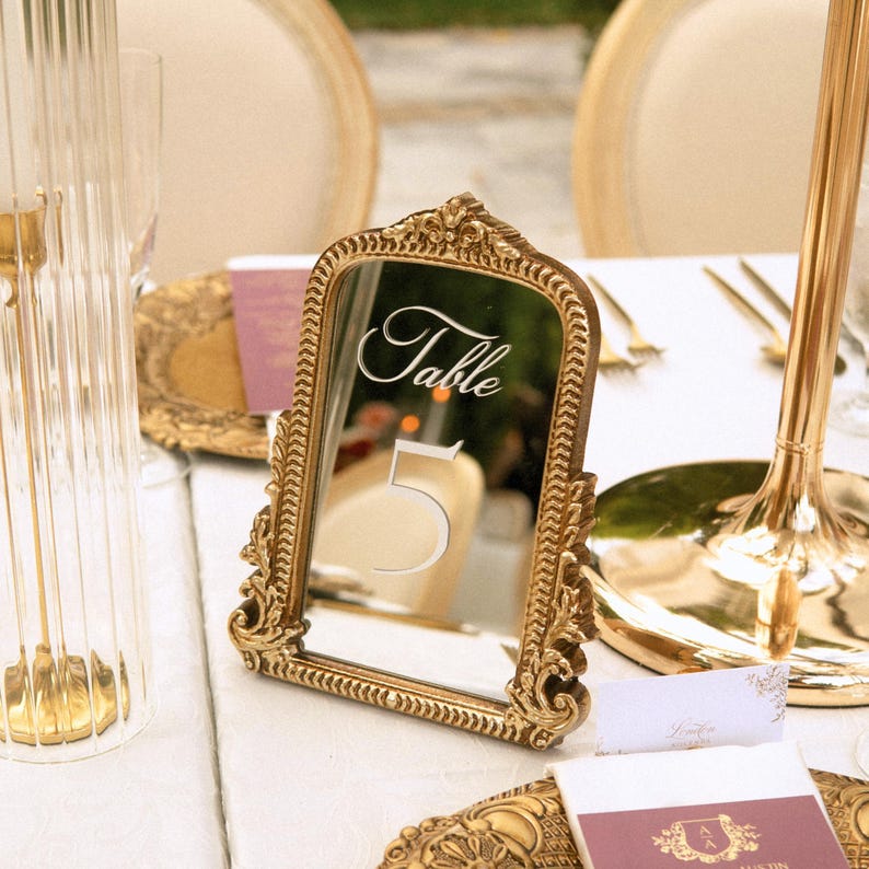 Our Mirror Wedding Table Numbers bring timeless elegance to any celebration, serving as both functional Wedding Table Numbers and eye-catching Wedding Table Decor. Paired with warm Gold Reception Decor accents and a coordinating Wed Sign, these Mirrored Table Numbers Unique pieces create a polished, romantic atmosphere guests will remember.