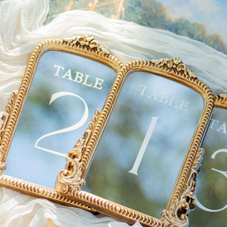 Our Mirror Wedding Table Numbers bring timeless elegance to any celebration, serving as both functional Wedding Table Numbers and eye-catching Wedding Table Decor. Paired with warm Gold Reception Decor accents and a coordinating Wed Sign, these Mirrored Table Numbers Unique pieces create a polished, romantic atmosphere guests will remember.