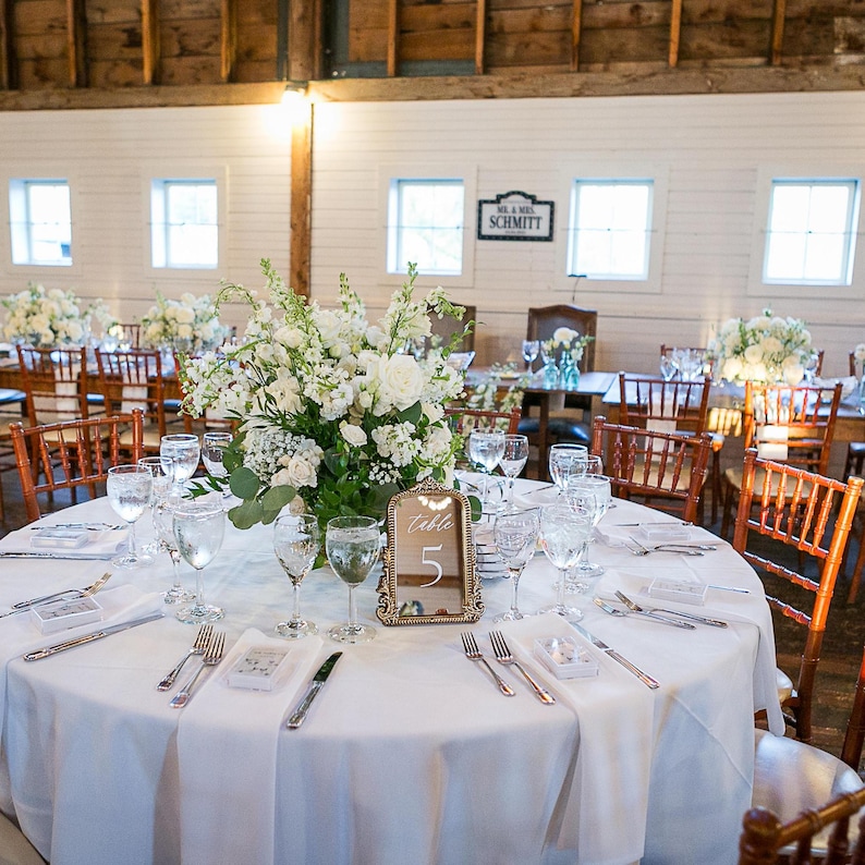 Our Mirror Wedding Table Numbers bring timeless elegance to any celebration, serving as both functional Wedding Table Numbers and eye-catching Wedding Table Decor. Paired with warm Gold Reception Decor accents and a coordinating Wed Sign, these Mirrored Table Numbers Unique pieces create a polished, romantic atmosphere guests will remember.