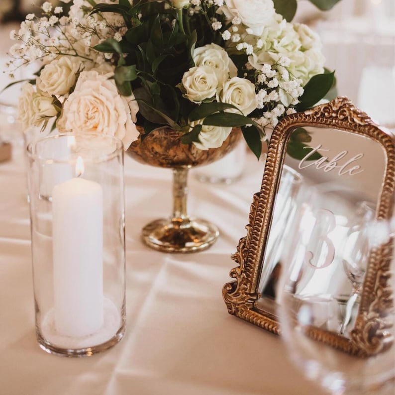 Our Mirror Wedding Table Numbers bring timeless elegance to any celebration, serving as both functional Wedding Table Numbers and eye-catching Wedding Table Decor. Paired with warm Gold Reception Decor accents and a coordinating Wed Sign, these Mirrored Table Numbers Unique pieces create a polished, romantic atmosphere guests will remember.