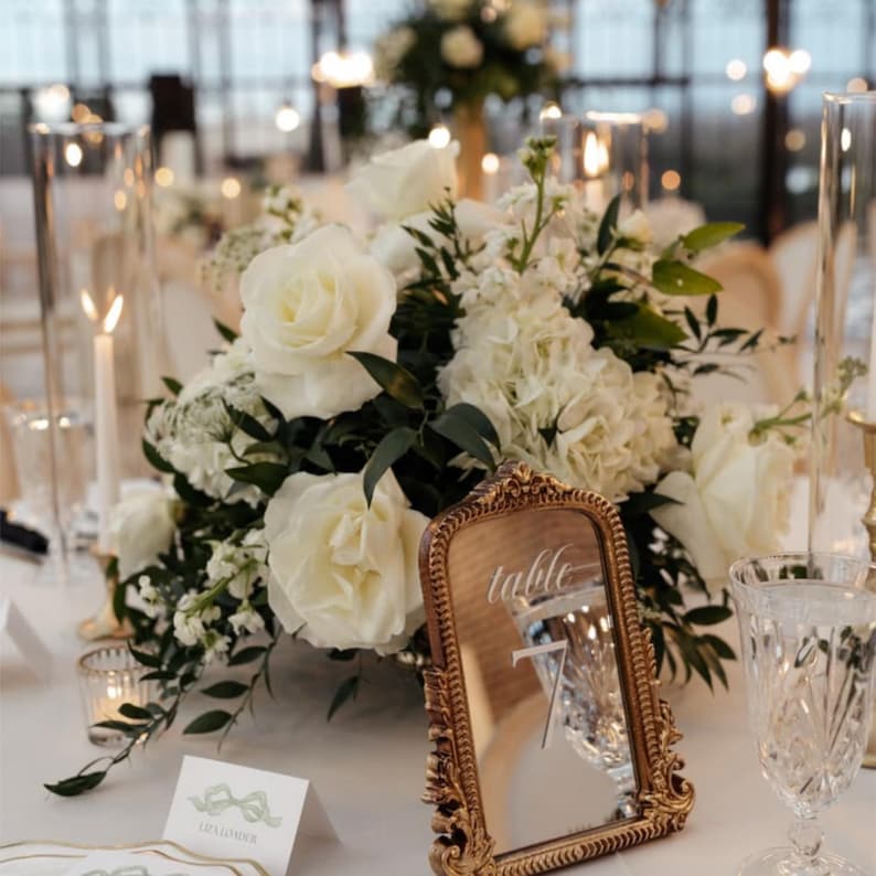 Our Mirror Wedding Table Numbers bring timeless elegance to any celebration, serving as both functional Wedding Table Numbers and eye-catching Wedding Table Decor. Paired with warm Gold Reception Decor accents and a coordinating Wed Sign, these Mirrored Table Numbers Unique pieces create a polished, romantic atmosphere guests will remember.