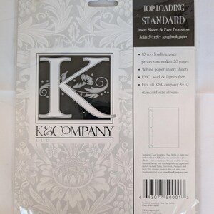 May include: A K&Company refill kit for scrapbook albums, featuring 10 top-loading page protectors and white paper inserts for 5.5 by 8.5 inch paper. The packaging is white and gray with a large letter K logo and detailed product information.
