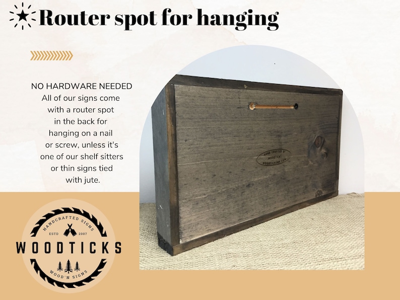 May include: The back of a wooden sign with a router spot for hanging. The sign is brown and has a white label with the text "HANDCRAFTED SIGNS ESTD 2007 WOODTICKS WOOD'N SIGNS".
