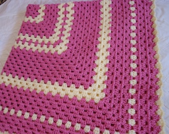 Granny square afghan pink and off white.