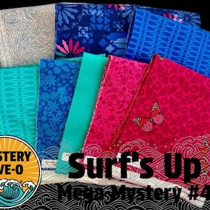 May include: A collection of folded fabric squares featuring various patterns in shades of blue, teal, green, and magenta. One magenta square displays a butterfly print. A circular logo in the corner reads MYSTERY FIVE-O, with text Surf's Up Mega Mystery #4.