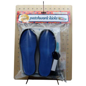 May include: A craft kit for patchwork kicks, featuring blue insoles, black laces, and various small components. The kit is packaged in a clear plastic bag and mounted on a wooden display board with the text "patchwork kicks".