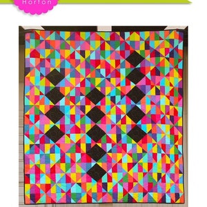 May include: A colorful quilt pattern called "Dangle" from the Banana Split Series by Charisma Horton. The quilt is made with 2 1/2 inch strips and measures 64 inches by 72 inches.