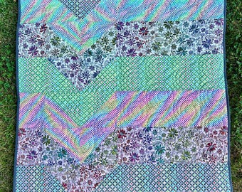 Tula Pink quilt kit featuring ROAR! fabrics and the Smidge pattern