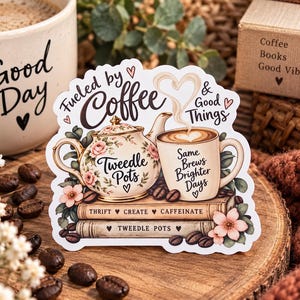 May include: A die-cut sticker featuring a floral teapot and a coffee mug with a heart-shaped steam swirl. The text reads Fueled by Coffee & Good Things, Tweedle Pots, Same Brews Brighter Days, Thrift Create Caffeinate, and Tweedle Pots on books.