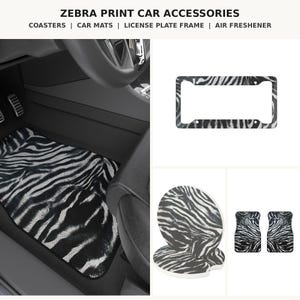 May include: Zebra print car accessories including a car floor mat, a number plate frame, and two circular coasters. The text ZEBRA PRINT CAR ACCESSORIES COASTERS | CAR MATS | LICENSE PLATE FRAME | AIR FRESHENER is displayed at the top.