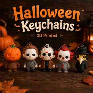 May include: Five 3D printed keychains featuring stylized horror characters: a pumpkin-headed figure, a man in a grey jumpsuit, a hockey-masked figure, a clown with red hair, and a plague doctor. The text reads Halloween Keychains 3D Printed.