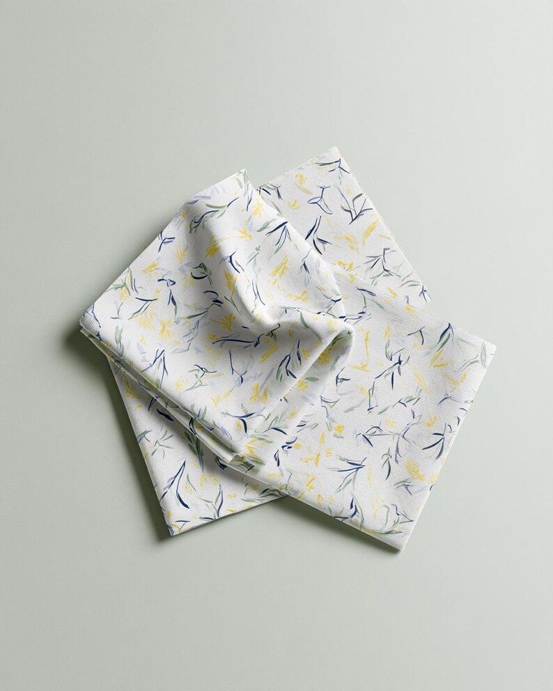 Square cocktail-napkin and paper-detail mockups with fine botanical line illustrations, styled with coordinating paper pieces. Digital presentation of a custom illustrated wedding and event design.