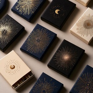 Dark matchbox mockups styled for an evening celebration, with plain and gold-toned decorative sleeve designs. The presentation shows compact rectangular boxes for personalised party favours.