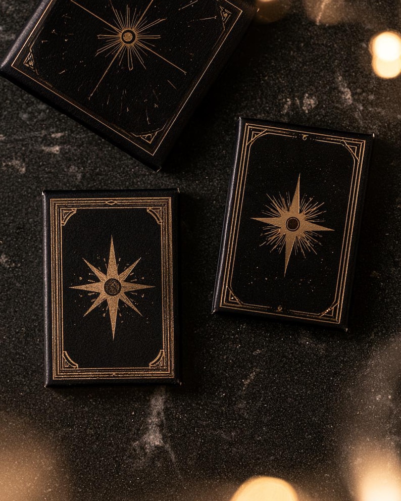 Dark matchbox mockups styled for an evening celebration, with plain and gold-toned decorative sleeve designs. The presentation shows compact rectangular boxes for personalised party favours.