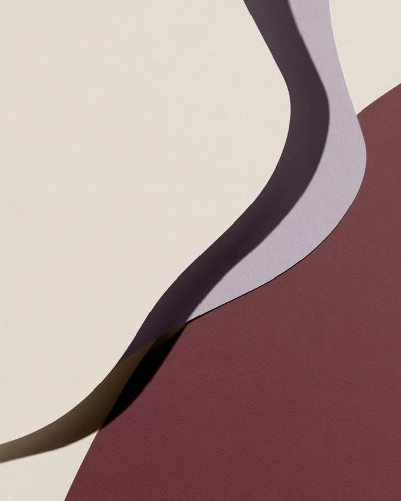 Layered unprinted menu-card mockups with curved paper edges in cream and muted burgundy tones. The arrangement shows contrasting paper shapes and soft shadows for a modern table-stationery design.